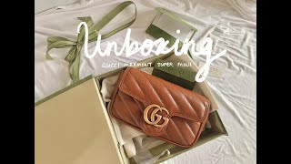 Unboxing  New Gucci Marmont Matelassé Super Mini Bag in Brown Leather [upl. by Triley918]